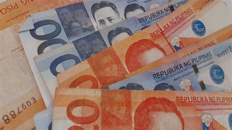 peso rebounds  stock markets rise weak  data businessworld