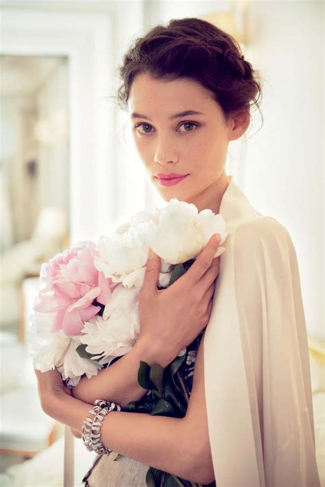 Download Astrid Berges-Frisbey posing elegantly in a photoshoot