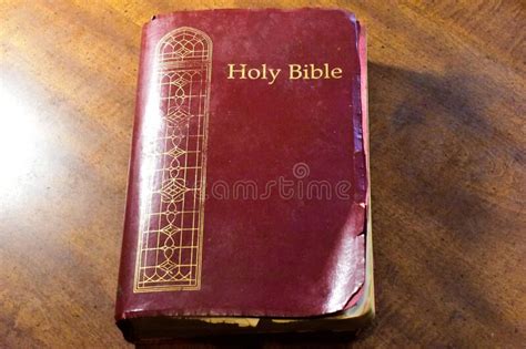 Holy Bible on Wood Table stock image. Image of cover - 194317753