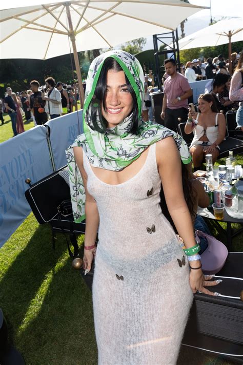 Charli D'Amelio Makes a Statement in Sheer Butterfly Dress and Combat