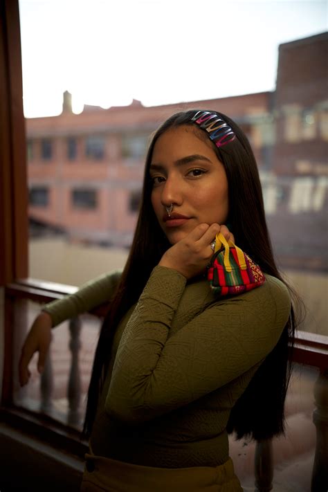 Indigenous Peruvian Woman And Young Girl In Traditional