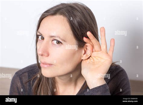 Symbol picture for listening Stock Photo - Alamy