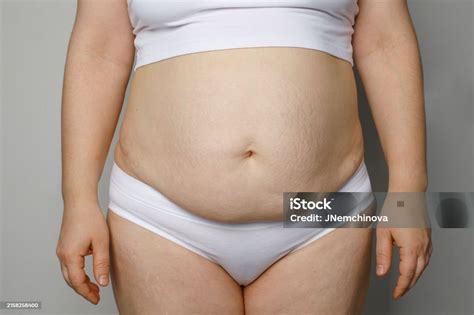 Woman With Fat Abdomen Close Up Stock Photo - Download Image Now