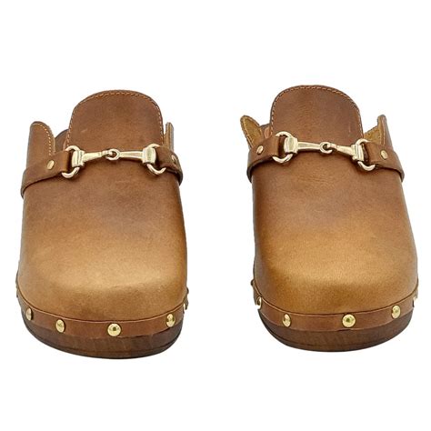 dutch clogs  leather  golden accessory   italy