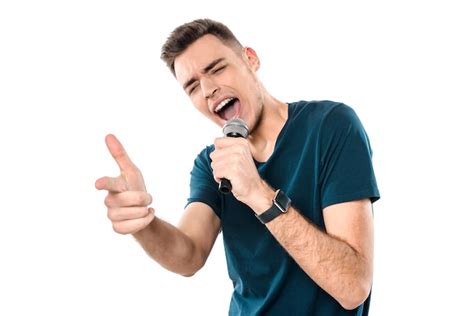 premium photo young handsome guy singing karaoke expressively