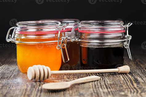beautiful natural honey of amber color, bee honey 9451292 Stock Photo