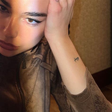DUA LIPA Tattoo: A Stunning Body Art by the Queen herself