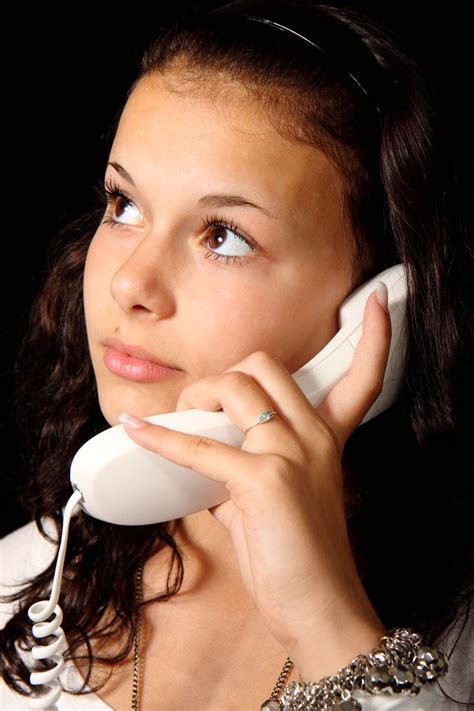 Young Woman With Telephone Free Stock Photo - Public Domain Pictures