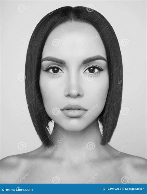 Fashion Beautiful Brunette with Short Haircut. Studio Portrait Stock