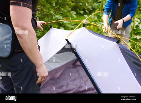 step  step guide    set   tent tourists put   tent