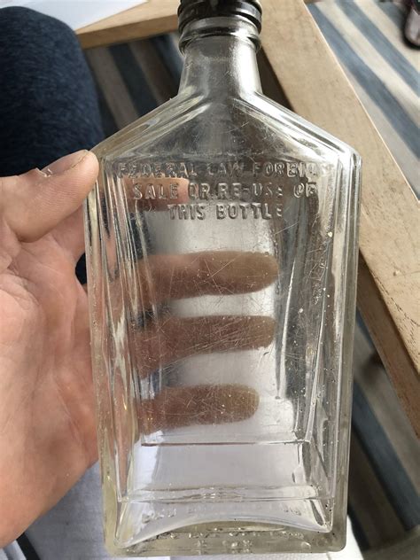 Un-earthed mystery bottle found on shore of Lake Michigan (west