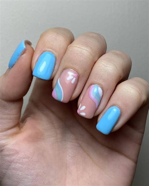 27 Early Spring Nail Trends with Nude and Soft Blue Tones for a Clean Look