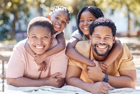 Portrait of relax black family in picnic nature park enjoy quality time ...