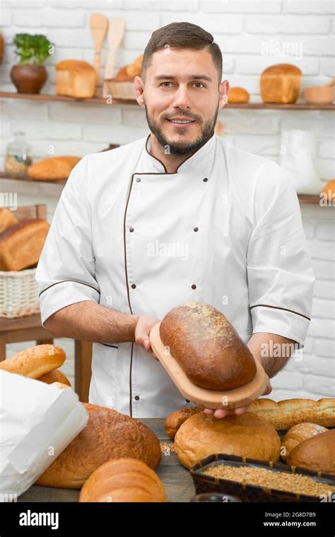Professional baker at his store Stock Photo - Alamy