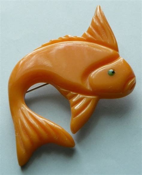 Bakelite fish pin. | Bakelite jewelry, Vintage bakelite, Bakelite pin