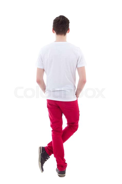back view of young man standing isolated on white | Stock image | Colourbox