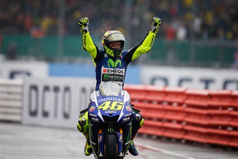 rossi wins  soaked silverstone ducati    podium