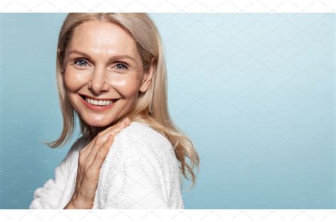 Smiling middle aged female model | Health & Medical Stock Photos