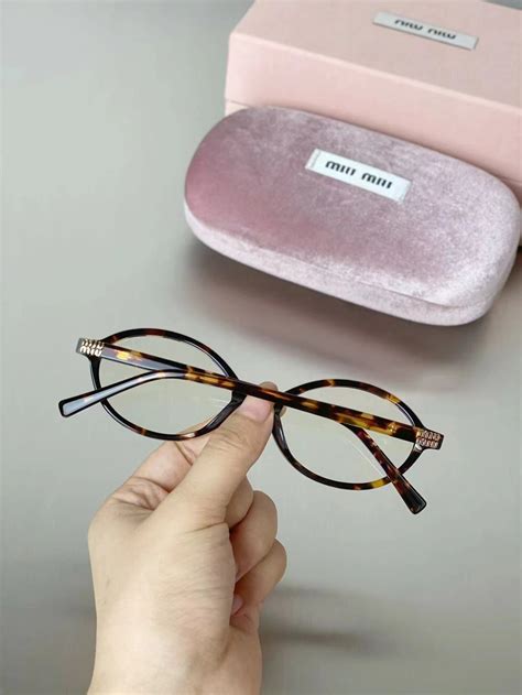 Очки Miu Miu купить на OZON по низкой цене