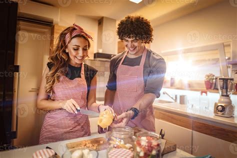 Teamwork In The Kitchen 14045220 Stock Photo at Vecteezy