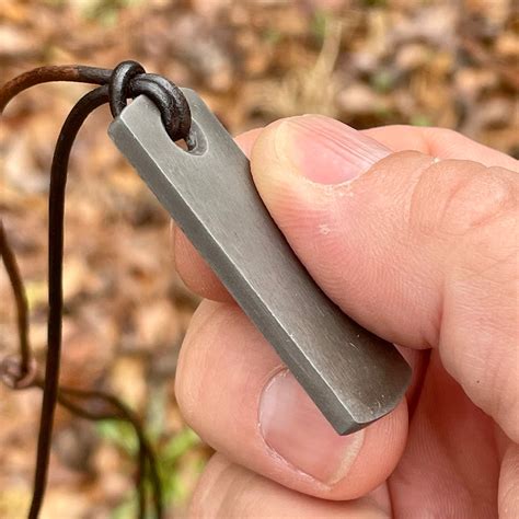 dual purpose forged carbon steel striker pendant necklace  flint