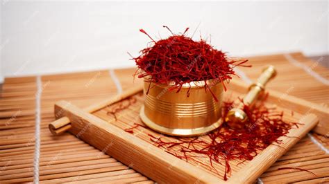 Premium Photo | Saffron spice put on a wooden square