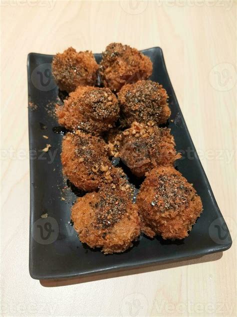 fried chicken wings with sesame seeds 25202352 Stock Photo at Vecteezy