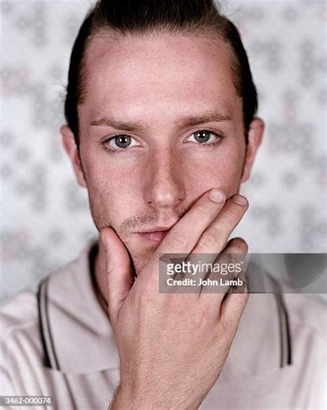 man hand face stock  high res pictures  images