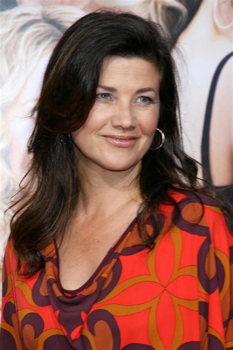 Daphne Zuniga arriving at the premiere of The Women at Manns Village