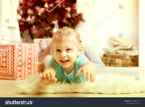 Beautiful Little Girl Lying On Floor Stock Photo 1236363115 | Shutterstock