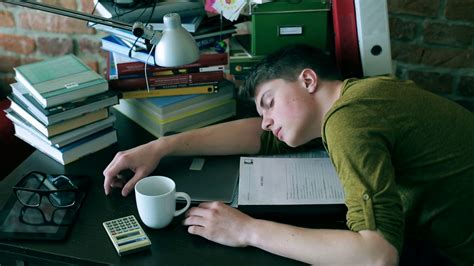Tired Student Sleeping On Desk Notes At Home Stock Footage SBV ...