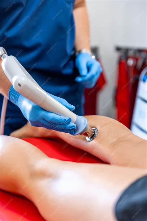 Premium Photo | Physical therapy of the shin with shock wave