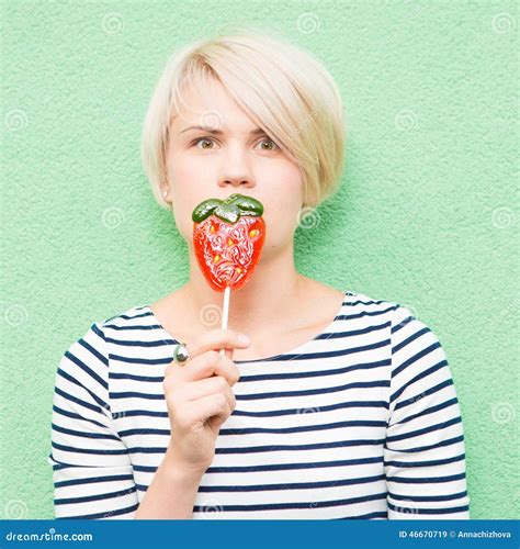 Young Woman Sucking Lollipop. Stock Image - Image of lips, face: 46670719