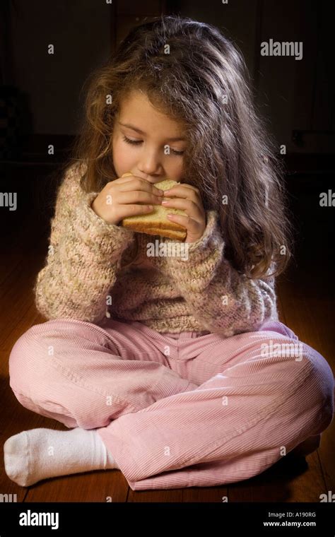 hungry child   sandwich stock photo alamy