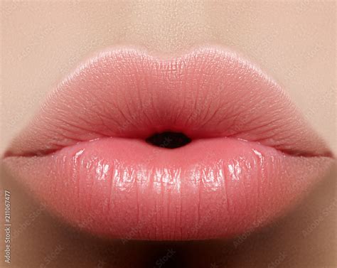 closeup kiss natural lip makeup beautiful plump full lips  female