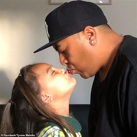 Father sparks controversy after sharing photo of him kissing his five-year-old daughter on the ...