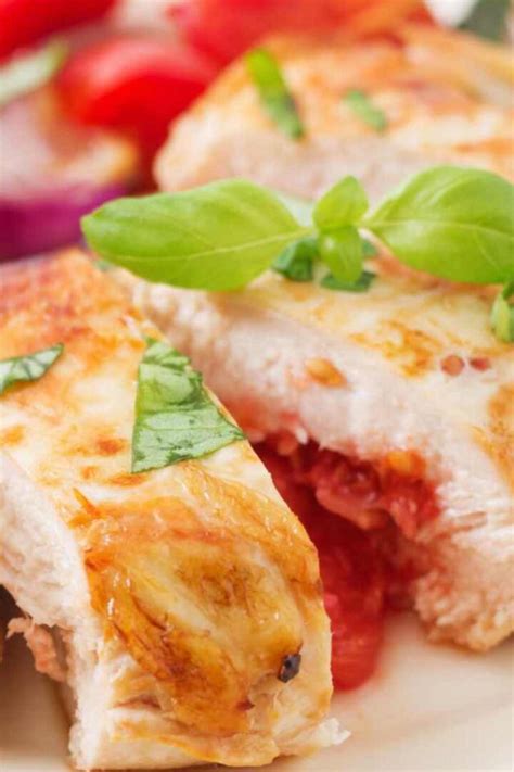 Chicken Stuffed With Mozzarella, Tomato And Basil - RecipeMagik