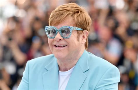 elton john bio age parents husband children