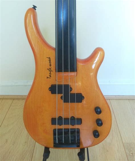 tanglewood rebel  fretless bass guitar catawiki