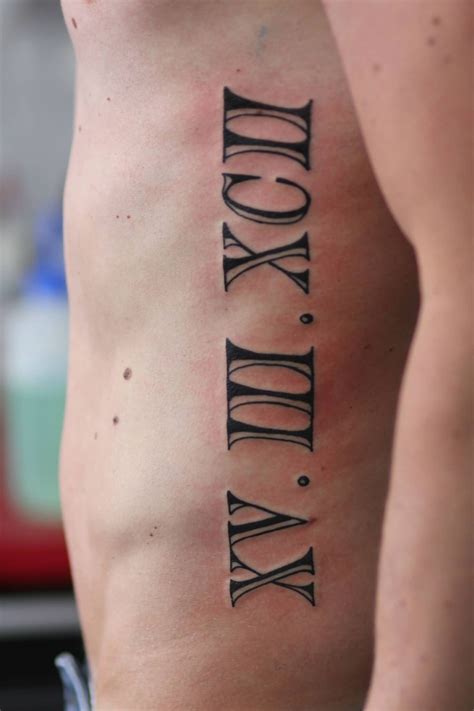 roman numerals tattoo man 7