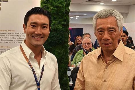 super juniors choi  won meets pm lee   race  straits times