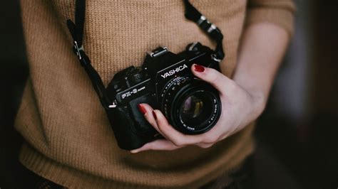 photographer woman  retro yashica camera   hand