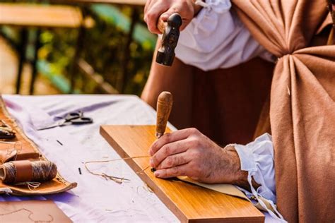 Premium Photo | Midsection of craftsmanship working on table