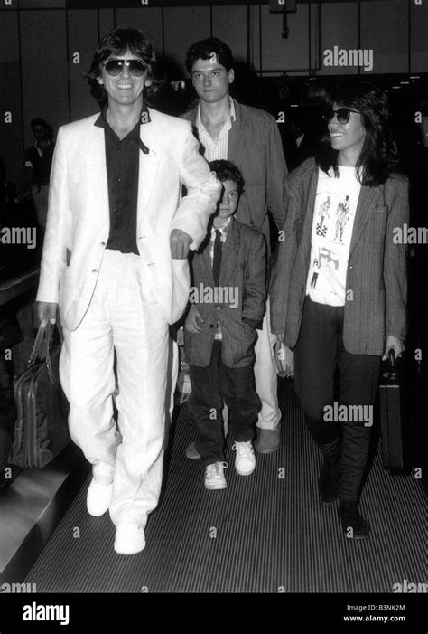 Former Beatles singer and guitarist George Harrison and family with a ...