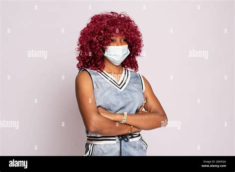 young black woman wearing a face mask Stock Photo - Alamy