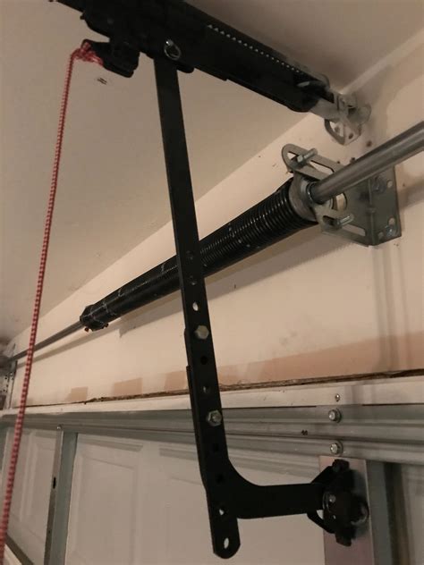 Adjusting a Torsion Spring on a Garage Door.
