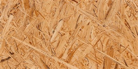 Premium AI Image | OSB pressed wood boasts a textured surface with a ...