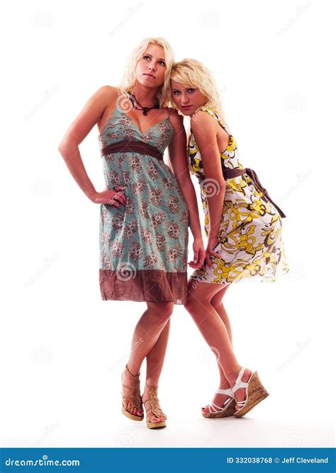 Two Caucasian Blond Sisters in Dresses on White Stock Photo - Image of