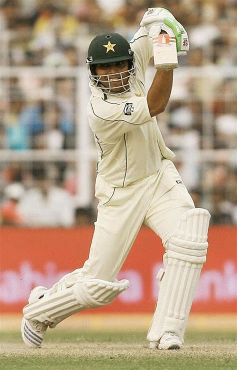 Kamran Akmal drives during his fourth Test century against India ...