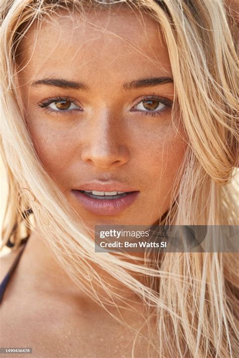 Model Olivia Dunne poses for the 2023 Sports Illustrated swimsuit ...